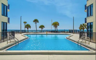 Photo 3 - Ground-Floor Beachfront Condo! Pools and Free Beach Chairs