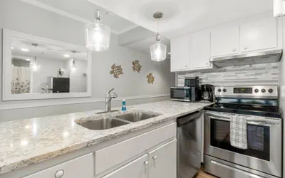 Photo 4 - Incredible Beachfront Corner Unit! Beach Chairs Service and Umbrella Included!