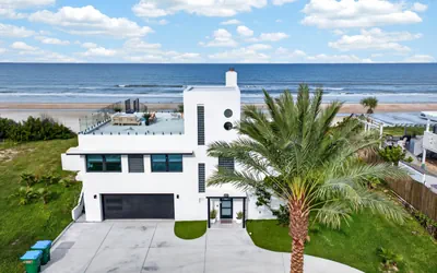 Jewel of the Shores Oceanfront Estate | Rooftop Lounge | Game Room