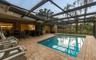 Photo 3 - Saltwater Pool Home | 4BR 9 Guests | Palm Harbor