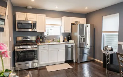Photo 2 - Modern Comfort: 2BR Townhome w/ Private Patio p20