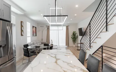 MODERN 4BR TOWNHOME BUILT IN 2023 WITH 2-CAR GARAGE, EV CHARGER & 2 BALCONIES (p63)
