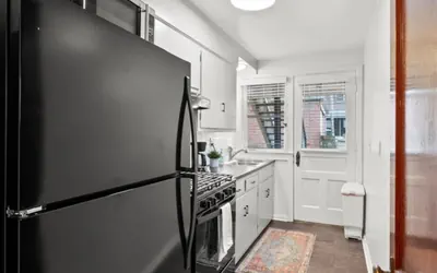 Photo 4 - Walk to High St • Free Parking & Private Backyard