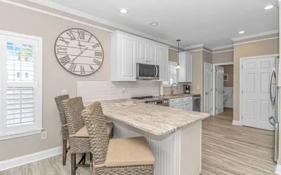 Photo 4 - 🌅 Luxury Waterfront Home in Ocean Lakes | Sleeps 10 | 2 Golf Carts | Lakefront Deck