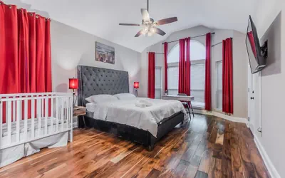Photo 4 - Discount Included! Stunning, Modern, Spacious Getaway Fits Any Group, 2 Game Rooms, Hot Tub 5 Bedroom Home by Redawning