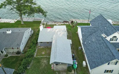 Photo 4 - Seasonal Lakefront Tawas City Home w/ Grill!