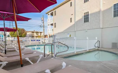 Photo 2 - Wildwood Condo w/ Pool Access, Steps to the Beach!