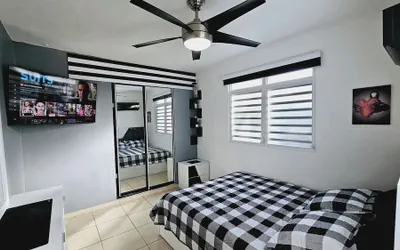 Photo 2 - Cozy and Modern Apartment Black & White With Jacuzzi on Terrace