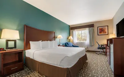 Photo 2 - SureStay Plus Hotel by Best Western Topeka Northwest