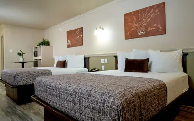 Photo 2 - Family Garden Inn & Suites