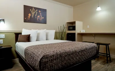 Photo 4 - Family Garden Inn & Suites