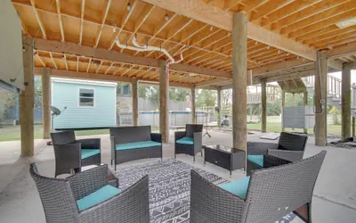 Photo 3 - Sunny Waveland Home Rental w/ Pool: Walk to Beach!