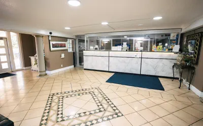 Photo 2 - Guest Inn & Suites