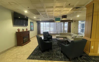 Photo 2 - Suburban Studios East Syracuse Carrier Circle