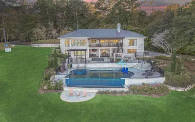 Photo 2 - 7BR Lakefront Haven Pool Hot Tub Gated 4acres