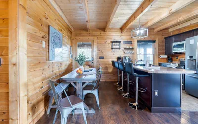 Photo 4 - Cozy Cabin Hot Tub Balcony Golf Simulator Near Pigeon Forge Smoky Mountain Group Retreat Mountains Are Calling by Avantstay