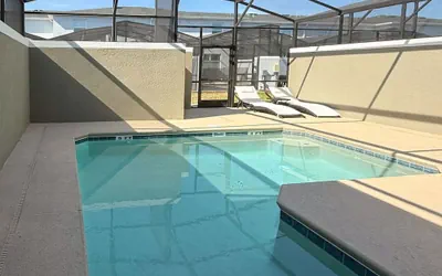Photo 2 - Contemporary Townhouse w Pool BBQ Sleeps 12