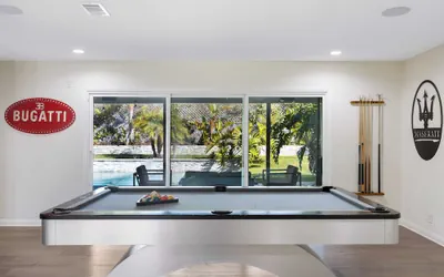 Photo 2 - Luxury Oasis w/ Pool + Hot Tub, Fire Pit, Pool Table Flight Ave by Avantstay