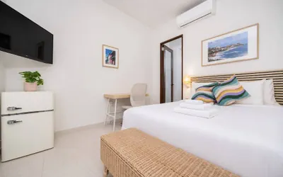 Photo 2 - Room 13: Breezy Veranda Stay w/ City Views