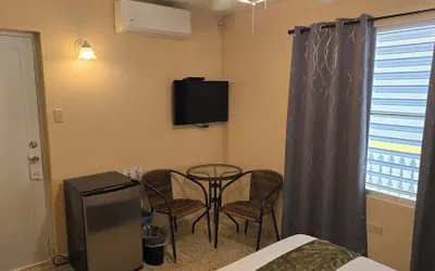 Photo 5 - I Love Combate Rooms & Suites