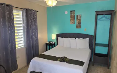 Photo 3 - I Love Combate Rooms & Suites