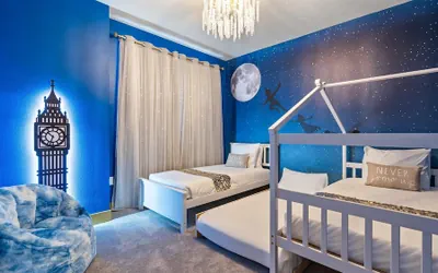 Photo 3 - Contemporary 4BR Townhome With Pool & Themed Rooms