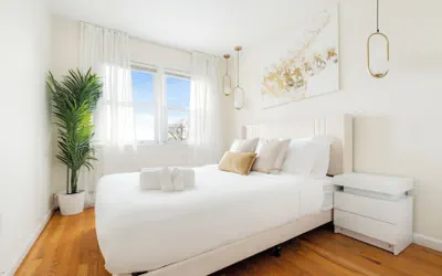 Photo 2 - Luxury 3BR NY Home with Free Parking