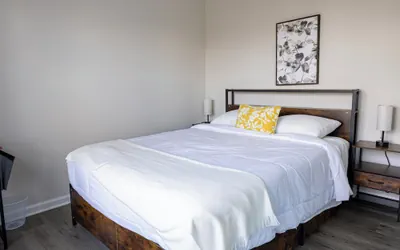 Photo 2 - Holistic Campus Rental, LLC - Private Bedrooms in Shared Home with Shared Kitchen