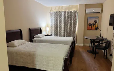 Photo 2 - New Harmon Loop Hotel