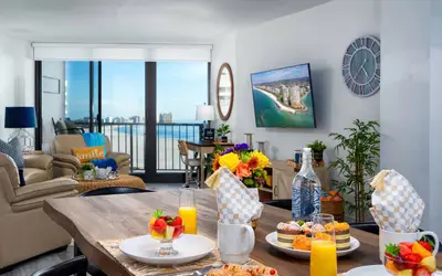 Waterfront Condo: Beach Access & Pool Luxury