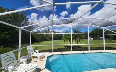 Spacious 4BR 2.5BA Pool Home in small community, close to attractions