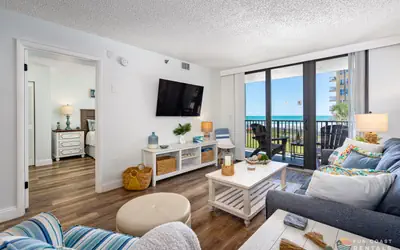 Ocean View Balcony just STEPS to the Beach with Pool, Parking and Wi-Fi!