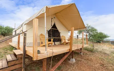 Settle Into a Cozy Old West Cabin Tent Escape