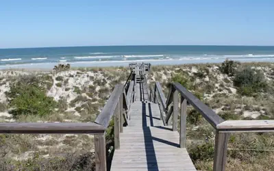 Ocean front Vacation Home with a large screened-in Patio