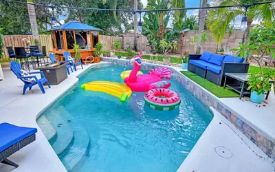 Urban Oasis with Hot Tub, HEATED POOL and Private Movie Theater