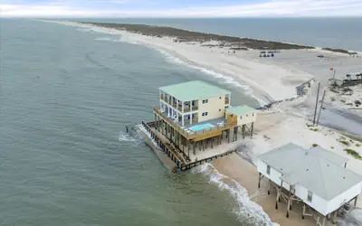 Shamrock Shores - GULF FRONT west end PET FRIENDLY property with room for everyone.  3 Master suites!