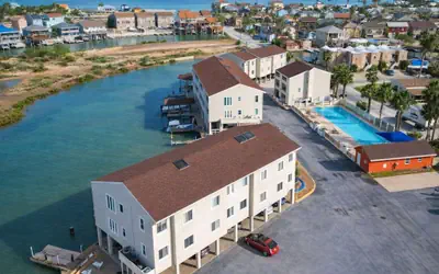 * Boat Slip * Waterfront Pool * Bay Sunset Views