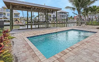 218 Oasis: Heated Pool Home w/ Dock Access + Walk to Beach!
