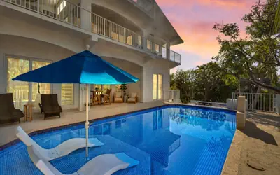 NEW LISTING! Reel Joy Waterfront Luxe with Pool and Private Dock