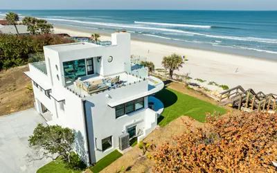 Jewel of the Shores Oceanfront Estate | Rooftop Lounge | Game Room