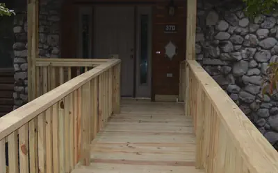 Forest view, log-sided two bedroom, two bath condo on Lake Ouachita. by RedAwning