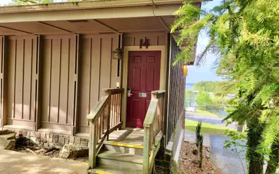 Lake View Queen Guest Room With Two Queens, Sleeper Sofa And Patio Overlooking Lake Ouachita. 1 Bedroom Hotel Room by RedAwning