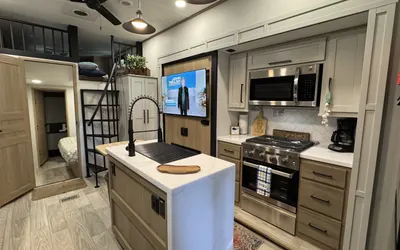 Tiki "Glamping" unit fully stocked RV w/golf cart