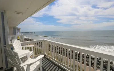 Beach Sunrise - Relaxing and Romantic!  Enjoy ocean views from the bedroom with balcony access.