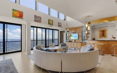 Penthouse Oasis: 180° Water Views & Heated Pool