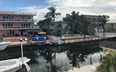 Beautiful Canal front Home with Above Ground Pool, Dock and Fish Station