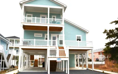 Coastal Chaos / 303 Sand Piper Ln.