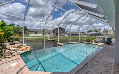 Cape Coral 3-Bedroom Canalfront Pool Vacation Home with Dock
