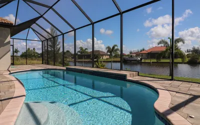 South Gulf Cove 3 Bedroom Canal Pool Home