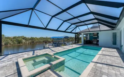 South Gulf Cove 3 Bedroom Pool + Spa on Canal Private Home